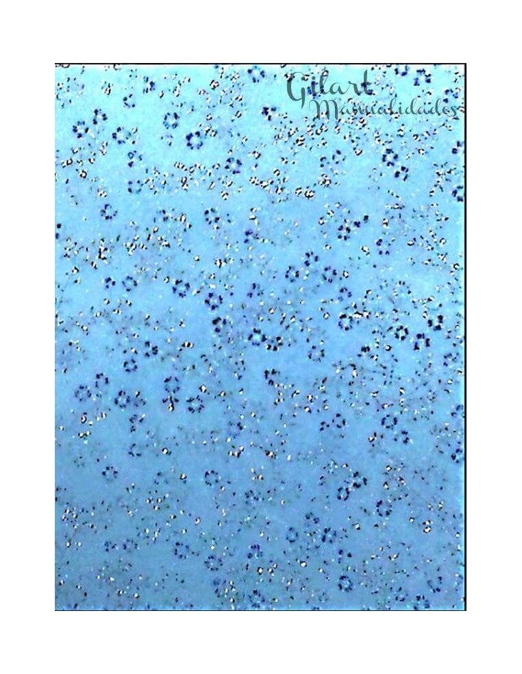 Papel scrapbooking fibra azul con flores plata para tus creaciones más elegantes.